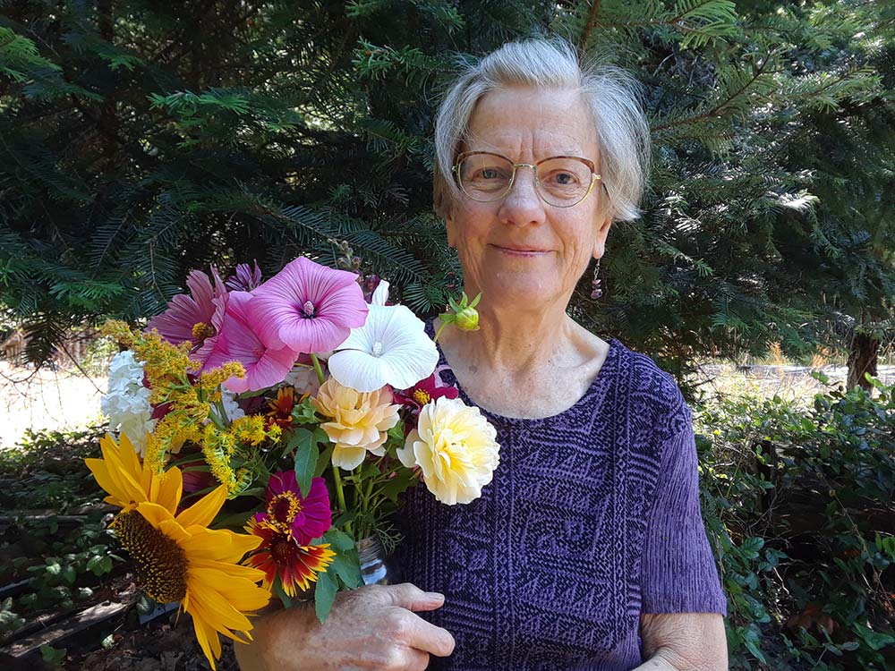 Mary holding flowers